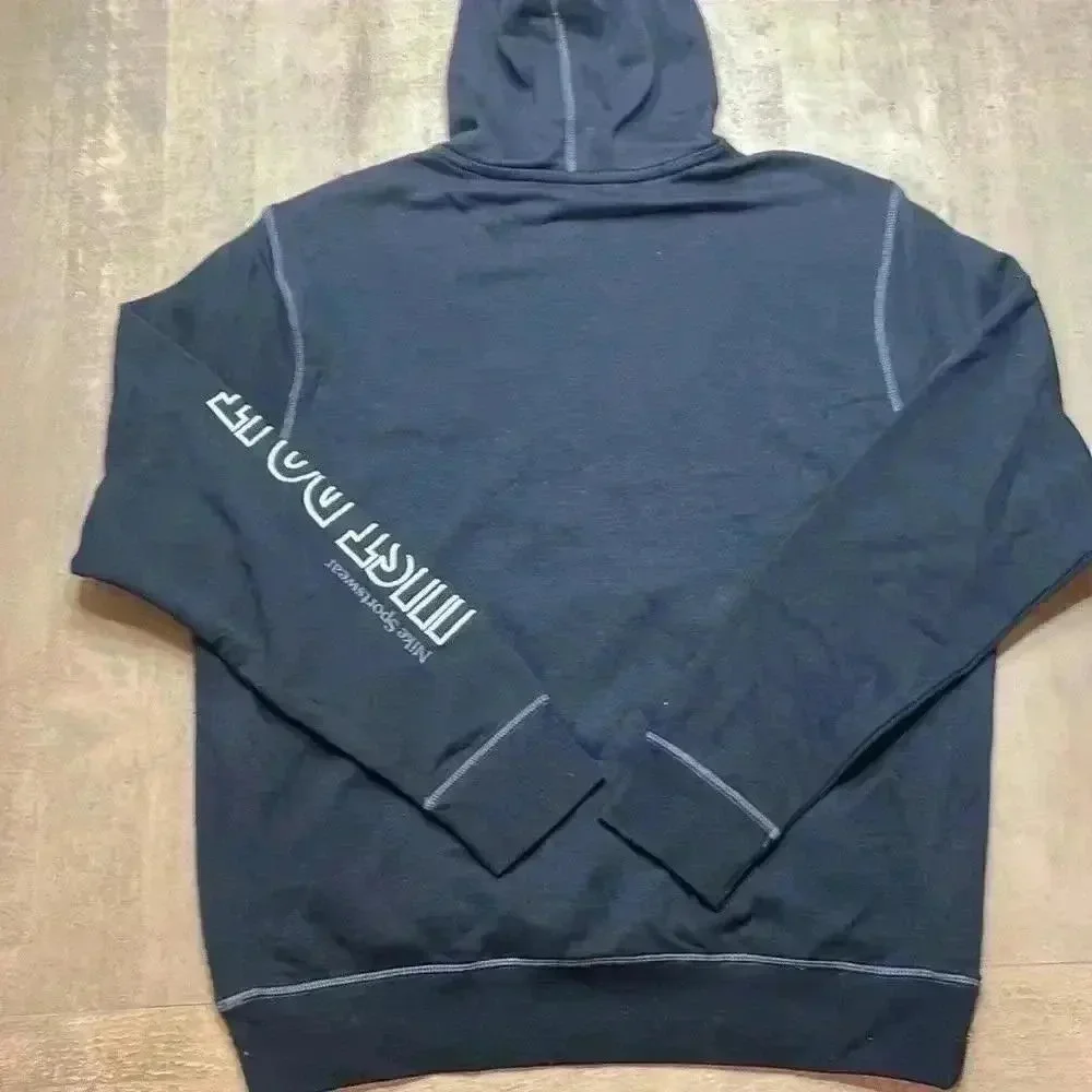 Nike hoodie, black with white lettering size Medium, perfect condition!